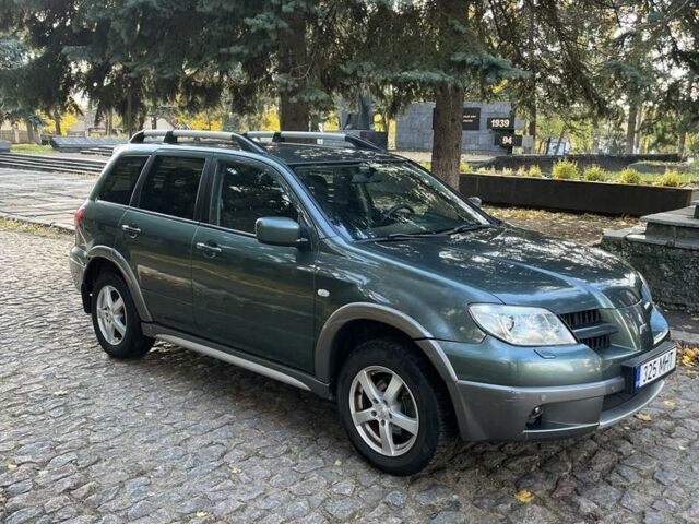Мицубиси Аутлендер 2007 в Тульчине на Automoto.ua Зеленый Мицубиси Аутлендер, объемом двигателя 2.4 л и пробегом 150 тыс. км за 4600 $, фото 2 на Automoto.ua