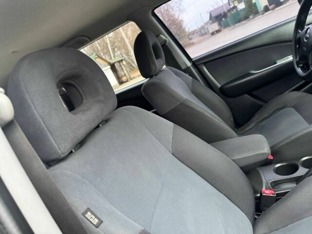 Зелений Міцубісі Аутлендер, об'ємом двигуна 2 л та пробігом 194 тис. км за 6350 $, фото 18 на Automoto.ua