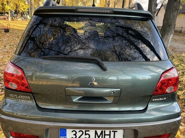 Міцубісі Аутлендер 2007 у Тульчине на Automoto.ua Зелений Міцубісі Аутлендер, об'ємом двигуна 2.4 л та пробігом 147 тис. км за 4550 $, фото 5 на Automoto.ua