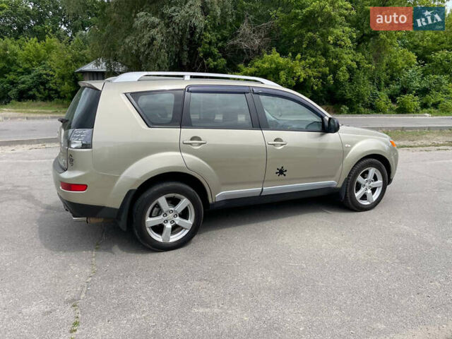 Зелений Міцубісі Аутлендер, об'ємом двигуна 2.4 л та пробігом 290 тис. км за 7000 $, фото 4 на Automoto.ua