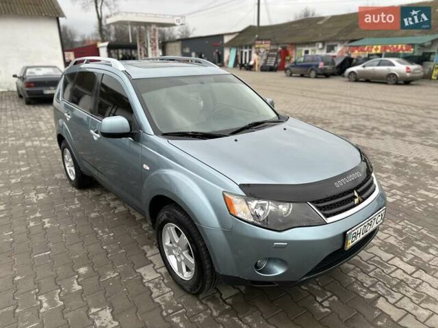 Зелений Міцубісі Аутлендер, об'ємом двигуна 2.36 л та пробігом 80 тис. км за 10500 $, фото 20 на Automoto.ua