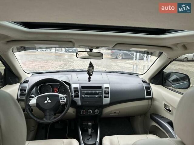 Зелений Міцубісі Аутлендер, об'ємом двигуна 2.36 л та пробігом 80 тис. км за 10500 $, фото 14 на Automoto.ua