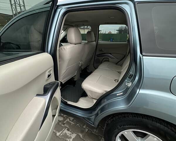 Зелений Міцубісі Аутлендер, об'ємом двигуна 2.36 л та пробігом 80 тис. км за 10500 $, фото 12 на Automoto.ua