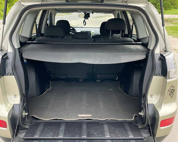 Зелений Міцубісі Аутлендер, об'ємом двигуна 2.4 л та пробігом 290 тис. км за 7000 $, фото 10 на Automoto.ua