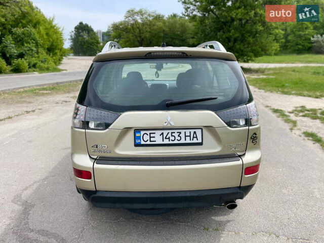 Зелений Міцубісі Аутлендер, об'ємом двигуна 2.4 л та пробігом 290 тис. км за 7000 $, фото 6 на Automoto.ua