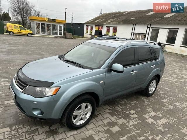 Зелений Міцубісі Аутлендер, об'ємом двигуна 2.36 л та пробігом 80 тис. км за 10500 $, фото 6 на Automoto.ua