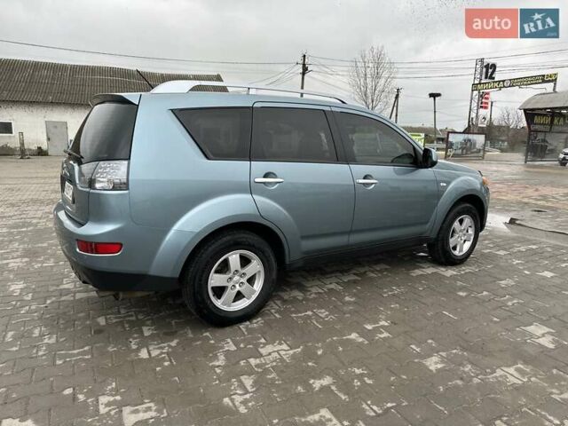 Зелений Міцубісі Аутлендер, об'ємом двигуна 2.36 л та пробігом 80 тис. км за 10500 $, фото 1 на Automoto.ua