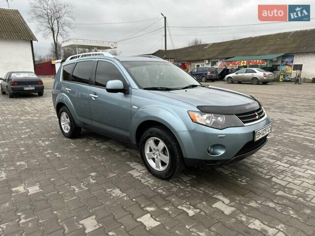 Зелений Міцубісі Аутлендер, об'ємом двигуна 2.36 л та пробігом 80 тис. км за 10500 $, фото 16 на Automoto.ua