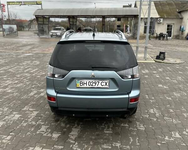 Зелений Міцубісі Аутлендер, об'ємом двигуна 2.36 л та пробігом 80 тис. км за 10500 $, фото 17 на Automoto.ua