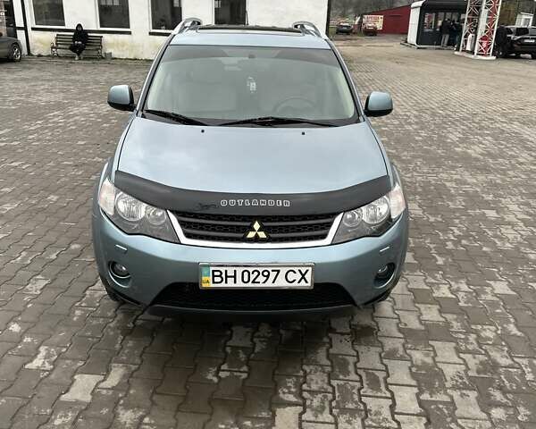 Зелений Міцубісі Аутлендер, об'ємом двигуна 2.36 л та пробігом 80 тис. км за 10500 $, фото 7 на Automoto.ua