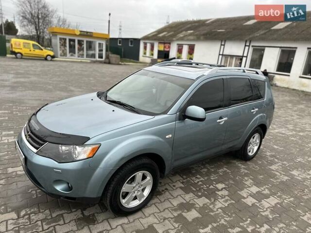 Зелений Міцубісі Аутлендер, об'ємом двигуна 2.36 л та пробігом 80 тис. км за 10500 $, фото 19 на Automoto.ua