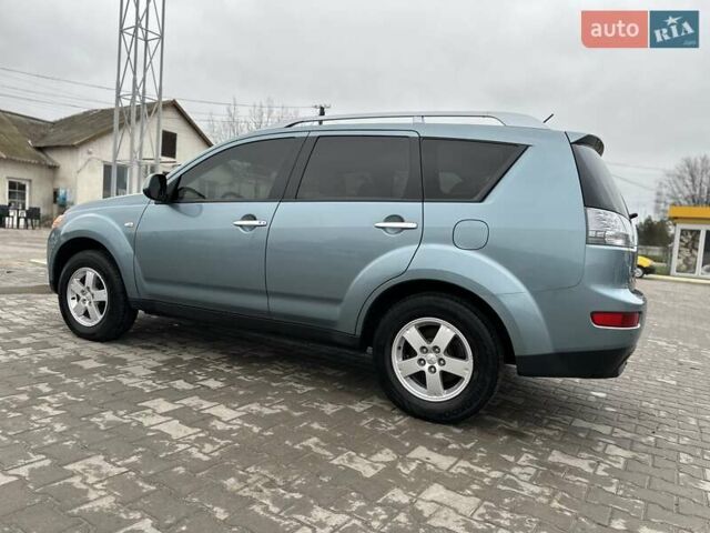 Зелений Міцубісі Аутлендер, об'ємом двигуна 2.36 л та пробігом 80 тис. км за 10500 $, фото 18 на Automoto.ua