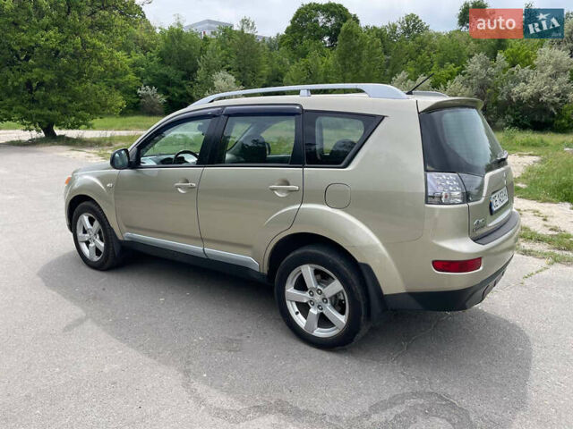 Зелений Міцубісі Аутлендер, об'ємом двигуна 2.4 л та пробігом 290 тис. км за 7000 $, фото 7 на Automoto.ua