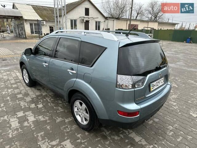 Зелений Міцубісі Аутлендер, об'ємом двигуна 2.36 л та пробігом 80 тис. км за 10500 $, фото 3 на Automoto.ua