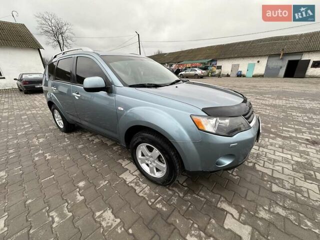 Зелений Міцубісі Аутлендер, об'ємом двигуна 2.36 л та пробігом 80 тис. км за 10500 $, фото 9 на Automoto.ua