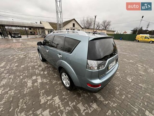 Зелений Міцубісі Аутлендер, об'ємом двигуна 2.36 л та пробігом 80 тис. км за 10500 $, фото 11 на Automoto.ua
