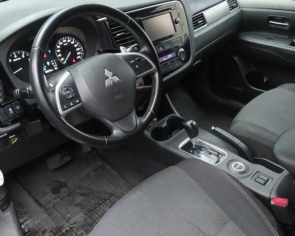 Помаранчевий Міцубісі Аутлендер, об'ємом двигуна 2.4 л та пробігом 166 тис. км за 11700 $, фото 2 на Automoto.ua