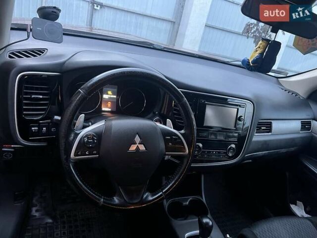 Оранжевый Мицубиси Аутлендер, объемом двигателя 2 л и пробегом 203 тыс. км за 14200 $, фото 2 на Automoto.ua