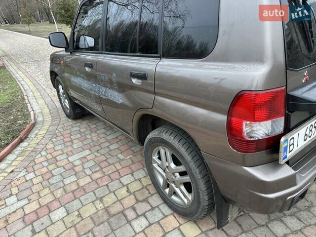 Бежевий Міцубісі Паджеро Пінін, об'ємом двигуна 1.83 л та пробігом 264 тис. км за 5750 $, фото 2 на Automoto.ua