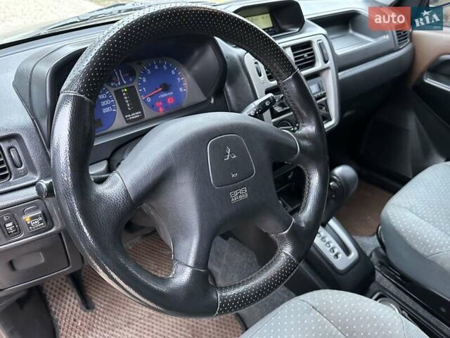 Бежевий Міцубісі Паджеро Пінін, об'ємом двигуна 1.83 л та пробігом 264 тис. км за 5750 $, фото 31 на Automoto.ua