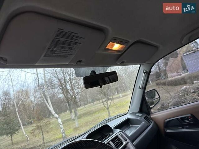 Бежевий Міцубісі Паджеро Пінін, об'ємом двигуна 1.83 л та пробігом 264 тис. км за 5750 $, фото 23 на Automoto.ua