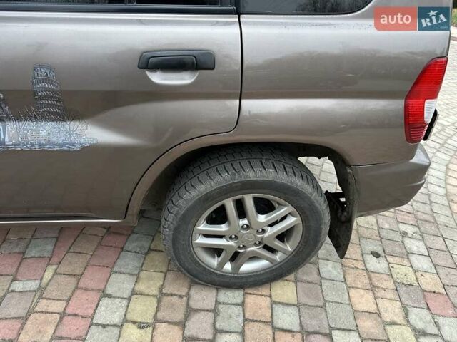 Бежевий Міцубісі Паджеро Пінін, об'ємом двигуна 1.83 л та пробігом 264 тис. км за 5750 $, фото 13 на Automoto.ua