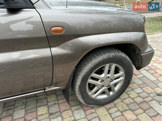 Бежевий Міцубісі Паджеро Пінін, об'ємом двигуна 1.83 л та пробігом 264 тис. км за 5750 $, фото 11 на Automoto.ua