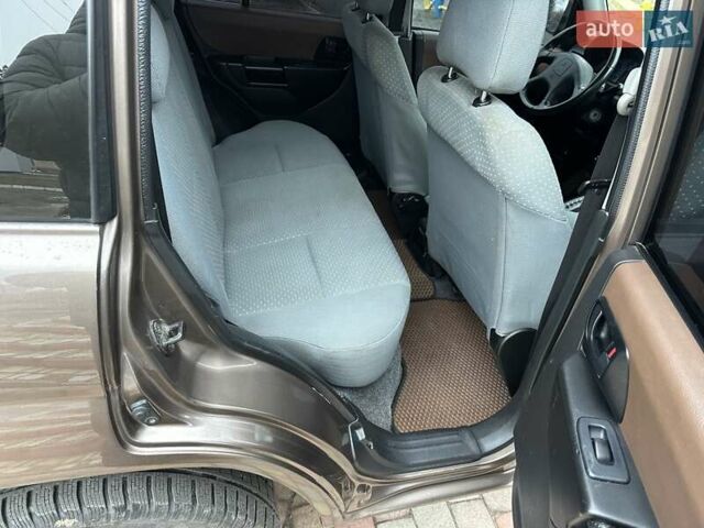 Бежевий Міцубісі Паджеро Пінін, об'ємом двигуна 1.83 л та пробігом 264 тис. км за 5750 $, фото 17 на Automoto.ua