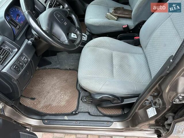 Бежевий Міцубісі Паджеро Пінін, об'ємом двигуна 1.83 л та пробігом 264 тис. км за 5750 $, фото 21 на Automoto.ua