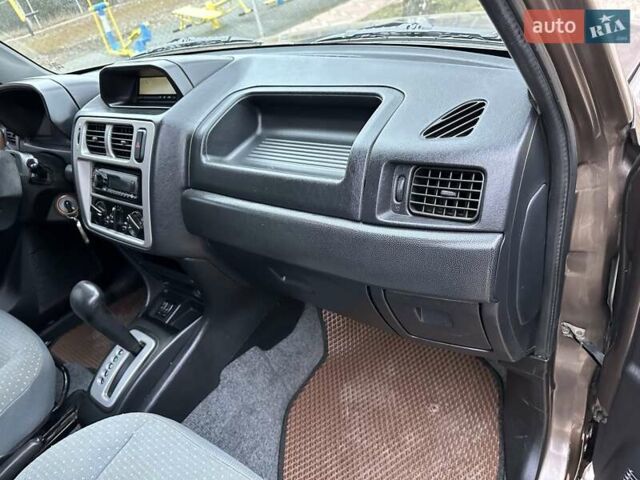 Бежевий Міцубісі Паджеро Пінін, об'ємом двигуна 1.83 л та пробігом 264 тис. км за 5750 $, фото 32 на Automoto.ua