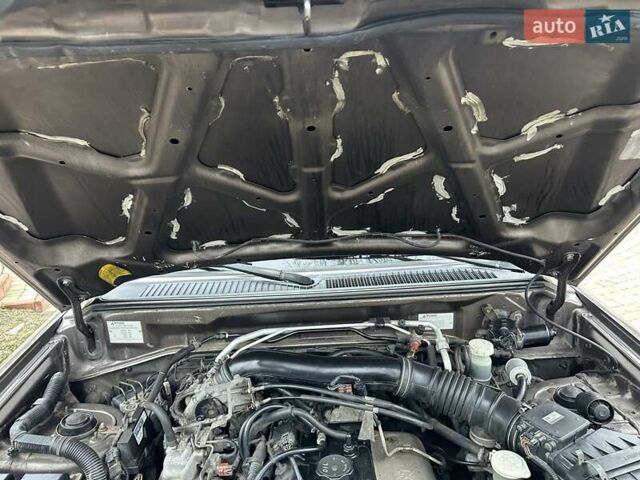 Бежевий Міцубісі Паджеро Пінін, об'ємом двигуна 1.83 л та пробігом 264 тис. км за 5750 $, фото 34 на Automoto.ua