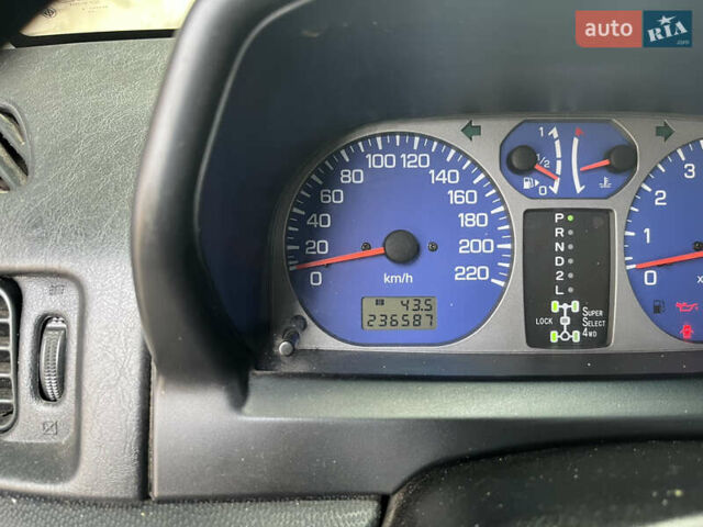 Бежевий Міцубісі Паджеро Пінін, об'ємом двигуна 2 л та пробігом 237 тис. км за 6000 $, фото 10 на Automoto.ua