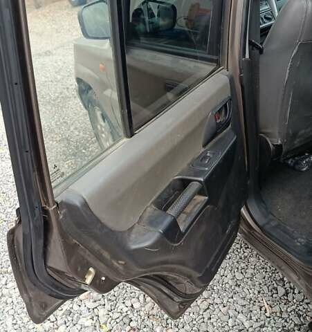 Коричневый Мицубиси Паджеро Пинин, объемом двигателя 1.83 л и пробегом 238 тыс. км за 2700 $, фото 7 на Automoto.ua