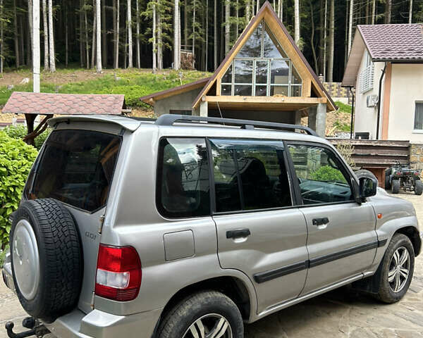 Серый Мицубиси Паджеро Пинин, объемом двигателя 2 л и пробегом 172 тыс. км за 6300 $, фото 2 на Automoto.ua