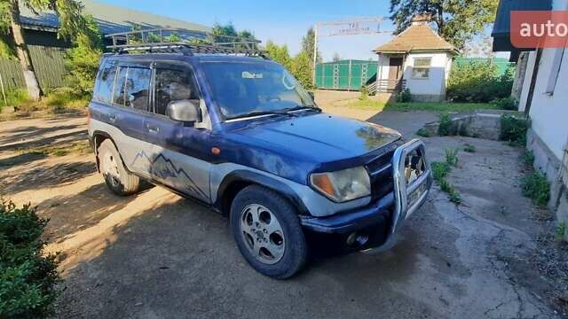 Синий Мицубиси Паджеро Пинин, объемом двигателя 1.8 л и пробегом 200 тыс. км за 5200 $, фото 11 на Automoto.ua