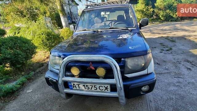 Синий Мицубиси Паджеро Пинин, объемом двигателя 1.8 л и пробегом 200 тыс. км за 5200 $, фото 4 на Automoto.ua