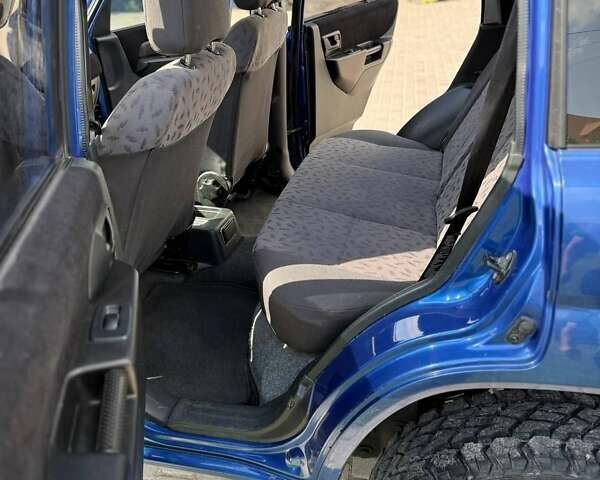 Синій Міцубісі Паджеро Пінін, об'ємом двигуна 2 л та пробігом 118 тис. км за 6950 $, фото 26 на Automoto.ua