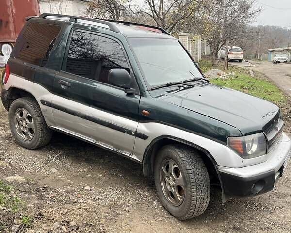 Зелений Міцубісі Паджеро Пінін, об'ємом двигуна 1.83 л та пробігом 890 тис. км за 2100 $, фото 11 на Automoto.ua