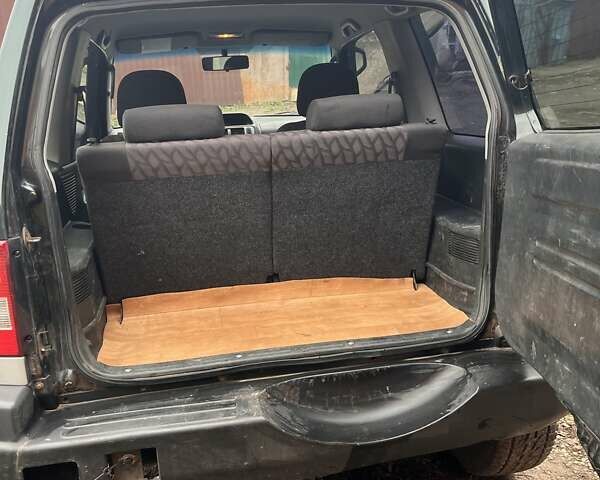 Зелений Міцубісі Паджеро Пінін, об'ємом двигуна 1.83 л та пробігом 890 тис. км за 2100 $, фото 8 на Automoto.ua