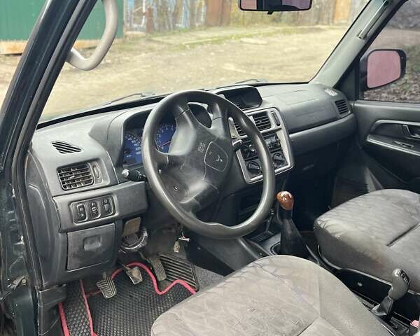 Зелений Міцубісі Паджеро Пінін, об'ємом двигуна 1.83 л та пробігом 890 тис. км за 2100 $, фото 5 на Automoto.ua