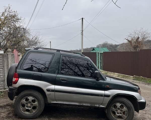 Зелений Міцубісі Паджеро Пінін, об'ємом двигуна 1.83 л та пробігом 890 тис. км за 2100 $, фото 10 на Automoto.ua