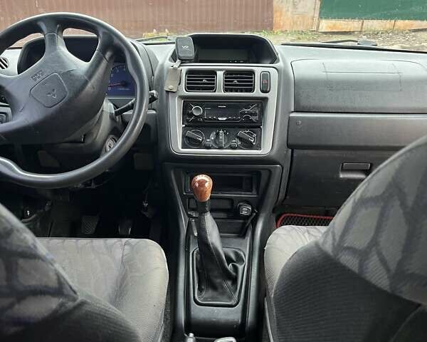 Зелений Міцубісі Паджеро Пінін, об'ємом двигуна 1.83 л та пробігом 890 тис. км за 2100 $, фото 6 на Automoto.ua