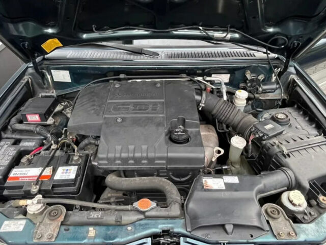 Зелений Міцубісі Паджеро Пінін, об'ємом двигуна 2 л та пробігом 199 тис. км за 2450 $, фото 7 на Automoto.ua