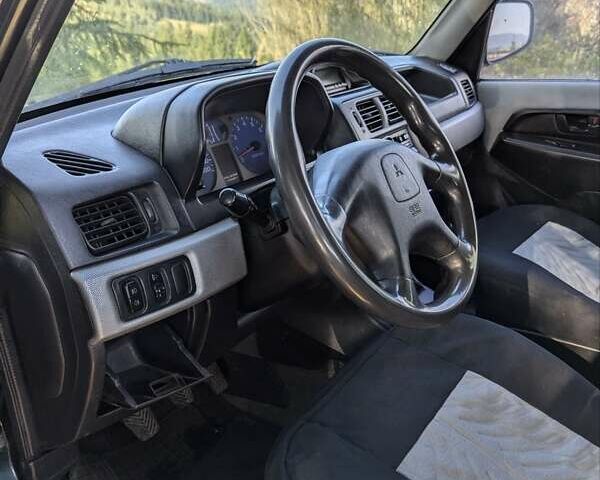 Зелений Міцубісі Паджеро Пінін, об'ємом двигуна 1.83 л та пробігом 270 тис. км за 4900 $, фото 11 на Automoto.ua