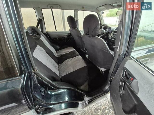 Зеленый Мицубиси Паджеро Пинин, объемом двигателя 1.8 л и пробегом 160 тыс. км за 4899 $, фото 7 на Automoto.ua