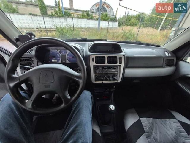 Зеленый Мицубиси Паджеро Пинин, объемом двигателя 1.8 л и пробегом 160 тыс. км за 4899 $, фото 13 на Automoto.ua