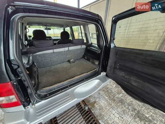 Зеленый Мицубиси Паджеро Пинин, объемом двигателя 1.8 л и пробегом 160 тыс. км за 4899 $, фото 11 на Automoto.ua