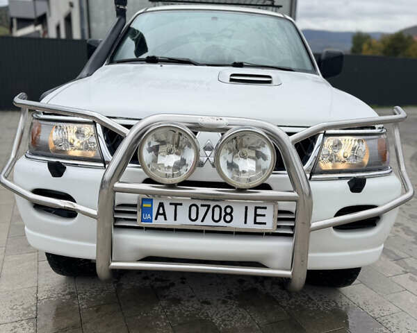Белый Мицубиси Паджеро Спорт, объемом двигателя 2.5 л и пробегом 168 тыс. км за 8900 $, фото 1 на Automoto.ua