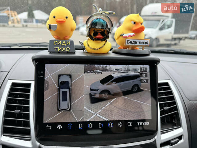 Білий Міцубісі Паджеро Спорт, об'ємом двигуна 2.48 л та пробігом 230 тис. км за 13500 $, фото 33 на Automoto.ua