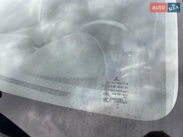 Білий Міцубісі Паджеро Спорт, об'ємом двигуна 2.48 л та пробігом 158 тис. км за 13000 $, фото 12 на Automoto.ua